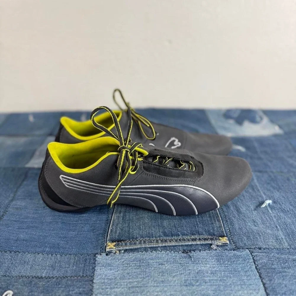 Puma black and yellow sneakers